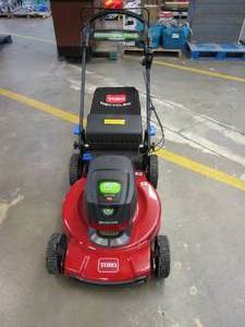 lot 497 image: TORO 21466T Recycler 22 in. SmartStow 60-Volt Max Lithium-Ion Cordless Battery Walk Behind Push Lawn Mower (Tool-Only)(LIKE NEW CONDITION)