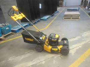 lot 513 image: DEWALT 20V MAX 21.5 in. Battery Powered Walk Behind Self Propelled Lawn Mower with (2) 10Ah Batteries & Charger(USED, BUT IN GOOD CONDITION)