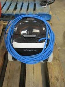 lot 540 image: DOLPHIN Explorer E30 Robotic Vacuum Pool Cleaner for In-Ground Swimming Pools up to 50 ft. (SWIVEL CABLE IS RIPPED IN 1 SPOT, SEE PHOTOS)
