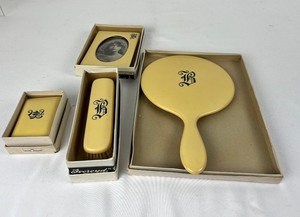 lot 14 image: Antique Ivoroyd Clothing brush, Hairbrush, Soap box and Mirror in Original Boxes