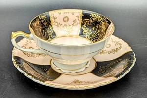lot 143 image: Vintage Porcelain Teacup With Saucer & Display Stand