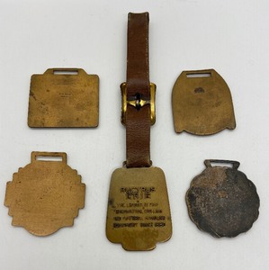 lot 196 image: Vintage 1960-70s Brass Watch Fobs - 5 Fobs and One Fob Band