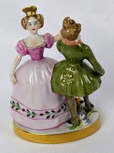 lot 200 image: Hand Painted Porcelain Victorian Dancers and Oval Leather Trinket Holder