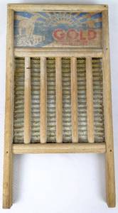 lot 286 image: Antique Rug Beater with Gold Brand Washboard