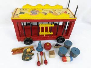 lot 300 image: 1932 Fisher Price Circus Parade Wagon, Bear, and Stunt Props
