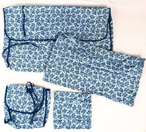 lot 253 image: Vintage Patterned Storage Covers for Linens - Snap-Close Holders for Tablecloths, Napkins, and More