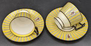 lot 184 image: Two Robert Allen Studio for Royal Doulton Cup and Saucer Sets - Yellow Stripes and Fruit