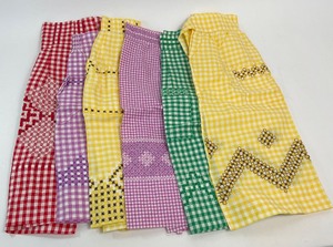 lot 341 image: Vintage Kitchen Accessories - 6 Darling Handmade Aprons and 25 Crocheted Potholders  Hot Pads