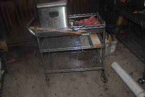 Metal cart on wheels plus contents ...