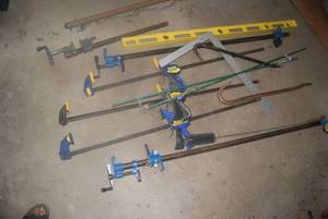 Lot of clamps, levels, pry bars and...