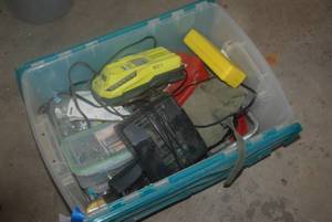 Coming tote full of tools, hardware...