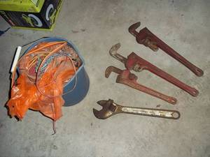 4 Wrenches and a Pail of Chains