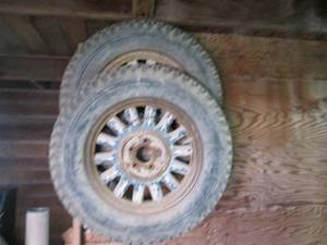 2wood spoke wheels with tires for a...