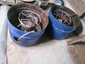 2 propane burners with barrel bases...
