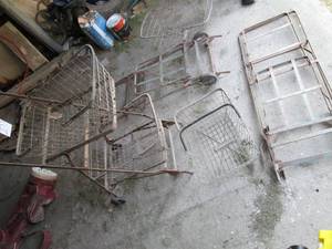 3 vintage metal grocery style carts...