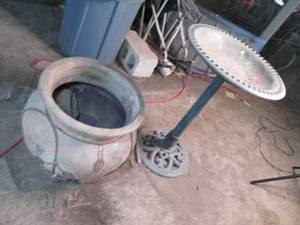 Plastic bird bath and large flower ...