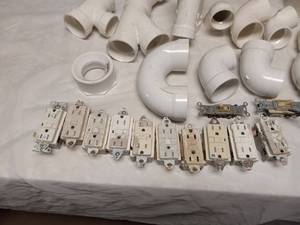 lot 5 image: PCV PIPE WALL OUTLETS AND WALL PLATES