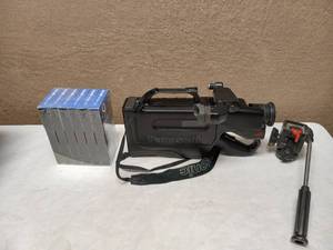 lot 59 image: VINTAGE PANASONIC CAMCORDER WITH BAG AND VHS TAPES