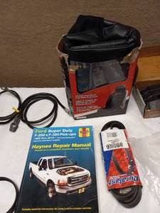 lot 70 image: HAYNES REPAIR BOOK AND CAR PARTS
