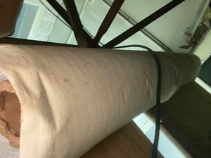 lot 109 image: Roll of tan wall paper
