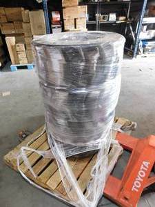 lot 34 image: SKIDSTEER SET OF 4 WHEELS 27X10.5 RUBBER IS SHOT AND RIMS SEEMS TO BE UNIVERSAL