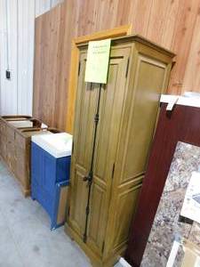 lot 52 image: Home Decorators Collection Clinton 24 in. W Linen Cabinet in Almond Latte