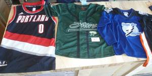 3 kids jerseys and 2 sleeveless shirts