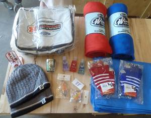 Football game pack - 2 stadium blankets, 2 rain ponchos, 2 pair of gloves, 2 stocking hats, hand sanitizer, key chains, bottle opener and a nice collapsible cooler