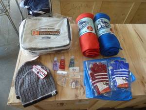 Football game pack - 2 stadium blankets, 2 rain ponchos, 2 pair of gloves, 2 stocking hats, hand sanitizer, key chains, bottle opener and a nice collapsible cooler