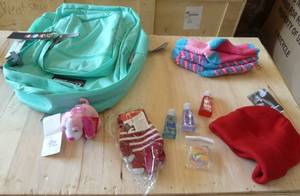 School survival kit - backpack, hat, gloves, socks, hand sanitizer and a toy to hang on the backpack