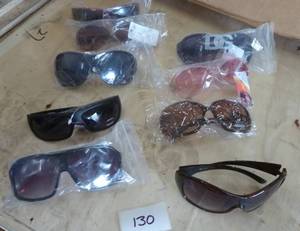 9 pair of adult sunglasses