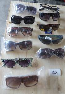 11 pair of adult sunglasses