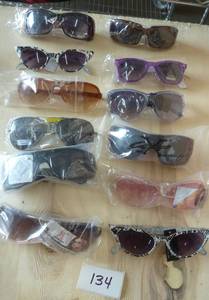 12 pair of adult sunglasses - check out the cat eyes