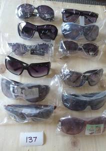 12 pair of adult sunglasses