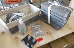 Nice basket, towels and wash cloths - again think Shower or Christmas gift