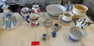 Group of vintage pottery bowls creamers and planter