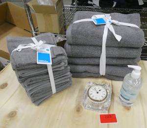 4 Grey Bath Towels, 18 wash cloths, sanitizer and a clock, another nice Christmas gift