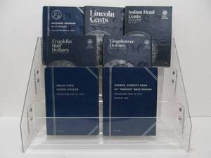 lot 34 image: Group of Coin Collector Books w Some Coins