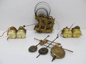 lot 62 image: Group of Vintage & Antique Clock Movements, Motors Pendulums etc