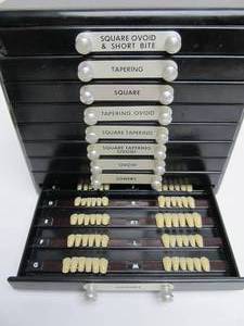 lot 113 image: Vintage Dentists Supply Company Multi-Drawer Tooth Cabinet