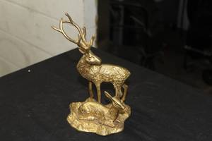 9 Buck Brass Table Statue
