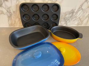 Group lot of (3) like new non stick cast iron bakeware pieces.