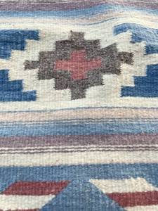 Vintage handmade wool rug used as wall hanging would look so amazing in a frame