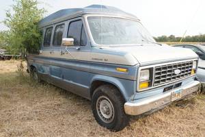 lot 7 image: 1990 Ford Econoline 150 conversion van with lift chair