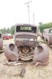 lot 57 image: antique pickup on trailer