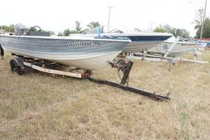 lot 69 image: Crest liner boat with Spartan trailer and Mariner motor