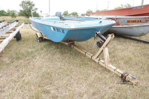 lot 76 image: Forester boat with Chrysler motor and trailer