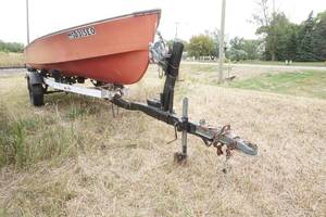 lot 78 image: fiberglass boat with Spartan trailer