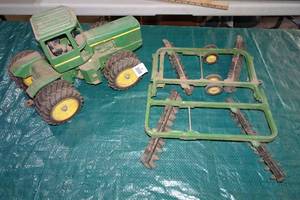 Vintage ERTL John Deere Articulating Tractor and Attachment