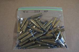 lot 104 image: 50 Loose .223 Rem HP Ammo